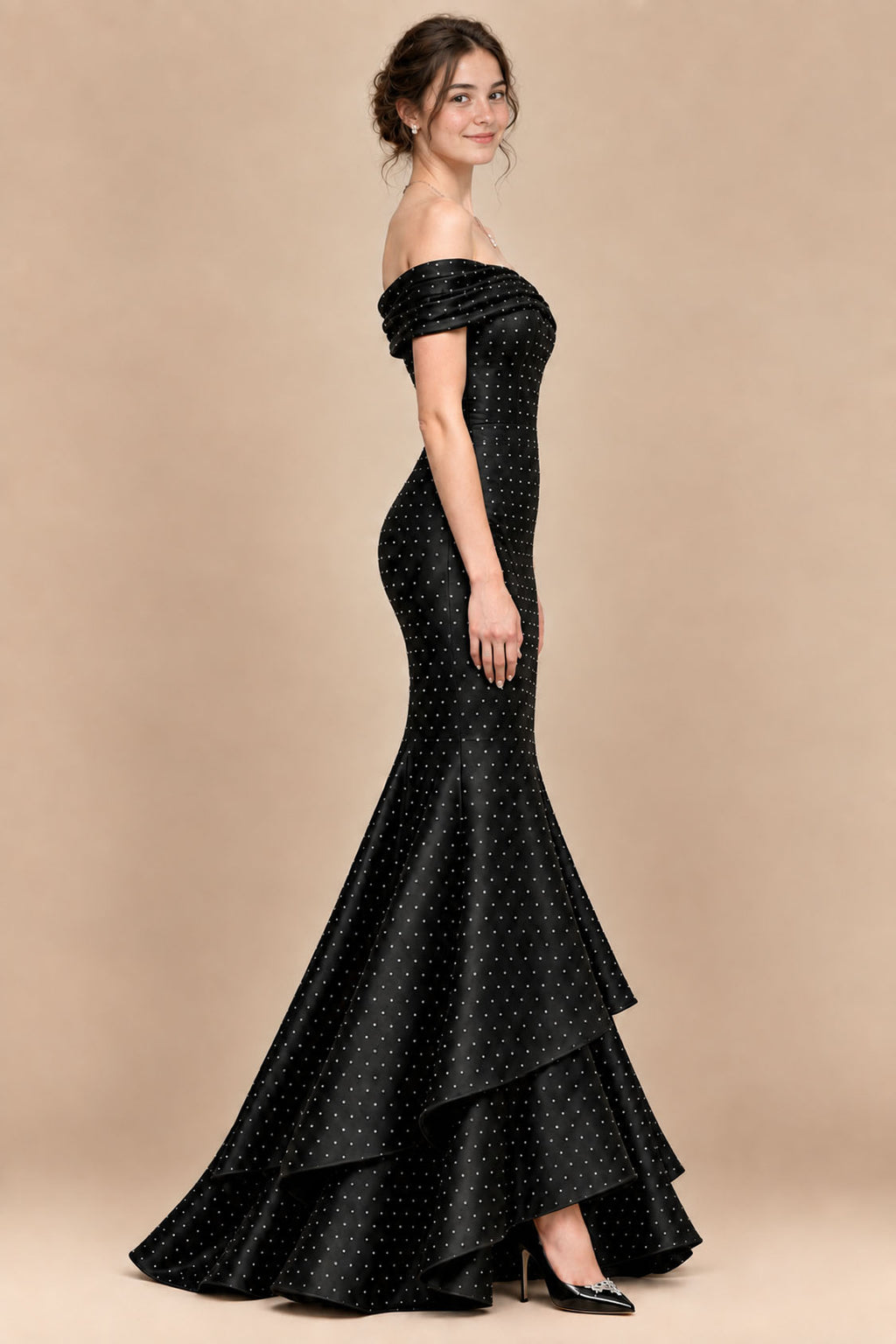Black satin rhinestone off-the-shoulder mermaid prom dress with tiered ruffle hem, side view
