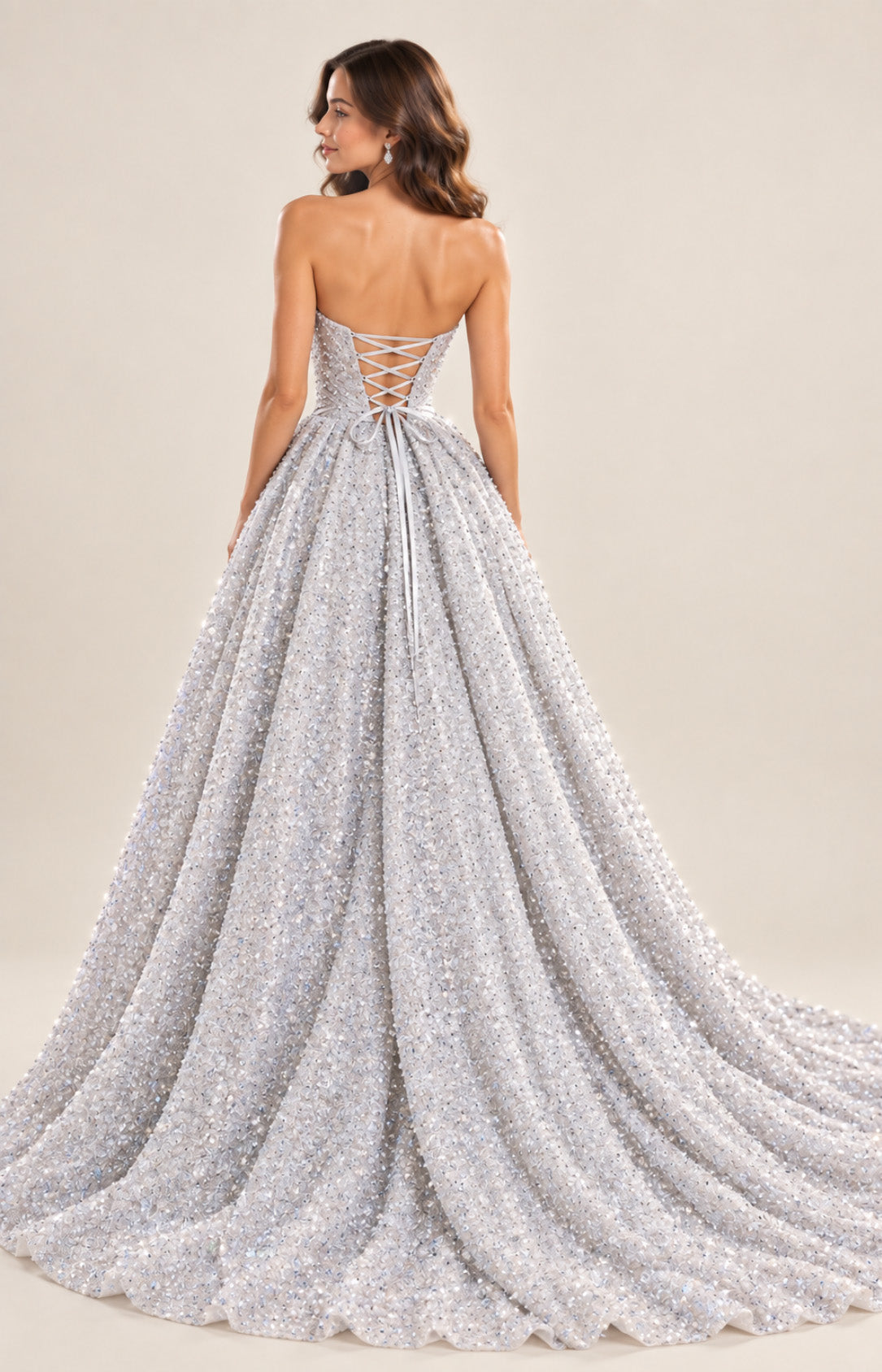 Silver glitter tulle ball gown prom dress with lace-up corset back and sweeping train, back view
