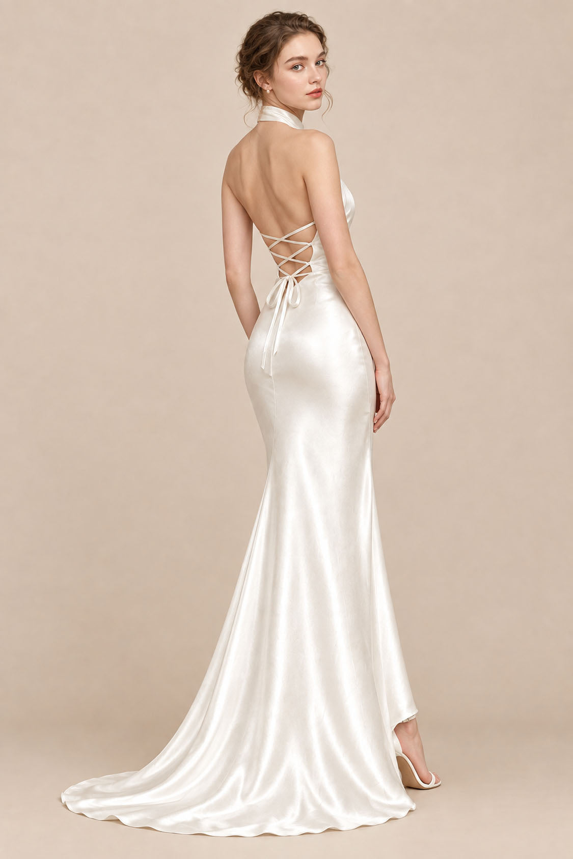 Ivory liquid satin open back mermaid wedding dress with lace-up back, rear three-quarter view