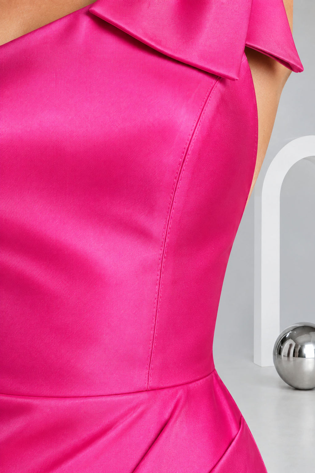 Hot pink satin one-shoulder bow sheath homecoming dress fabric detail