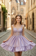 Lavender embroidered satin mini dress with tie bow straps and ruffle hem – front view | Xalpheor
