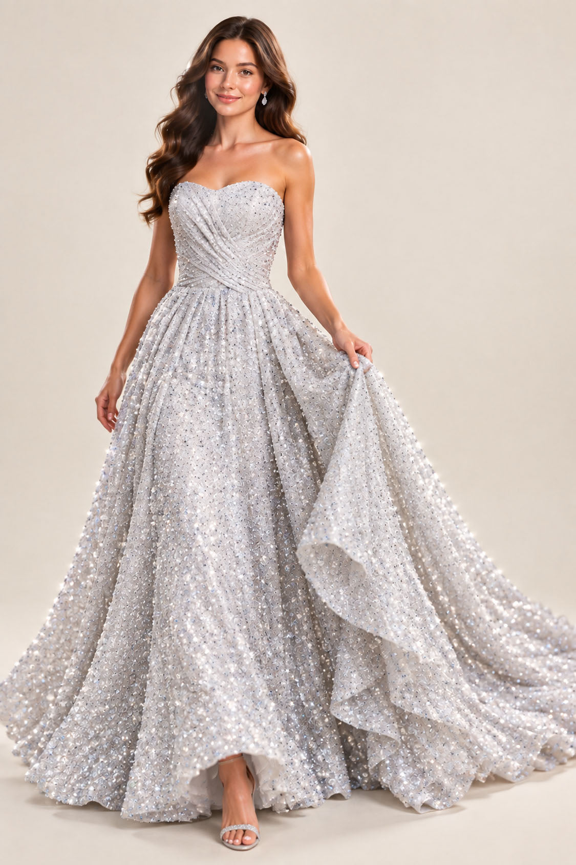 Silver glitter tulle ball gown prom dress in motion, model lifting the full skirt while walking
