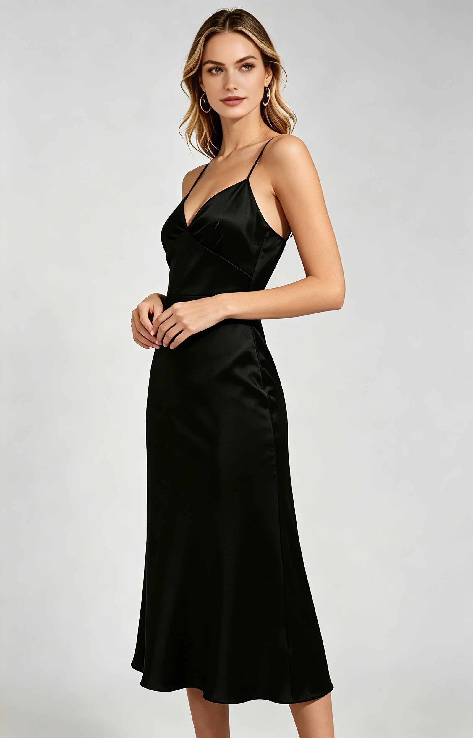 women black satin spaghetti strap midi dress side view 